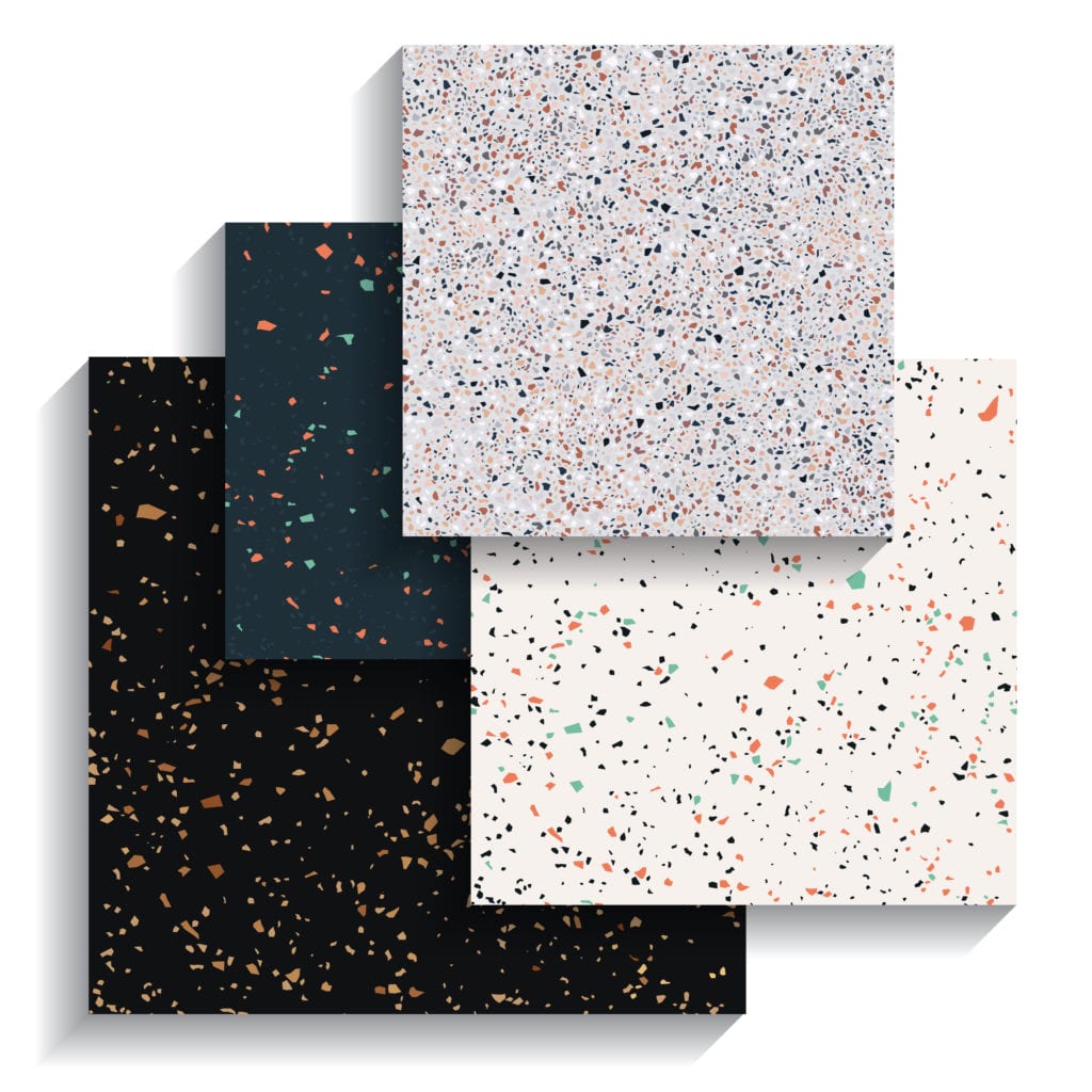 A group of four different colored speckled tiles.